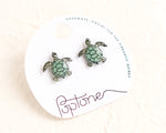 Load image into Gallery viewer, a pair of sea turtle earrings on a white background
