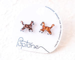 Load image into Gallery viewer, A pair of earrings in the shape of cats, with one cat being brown and the other orange, are displayed on a white background.
