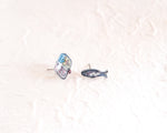 Load image into Gallery viewer, a pair of fish pins sitting on top of a white surface
