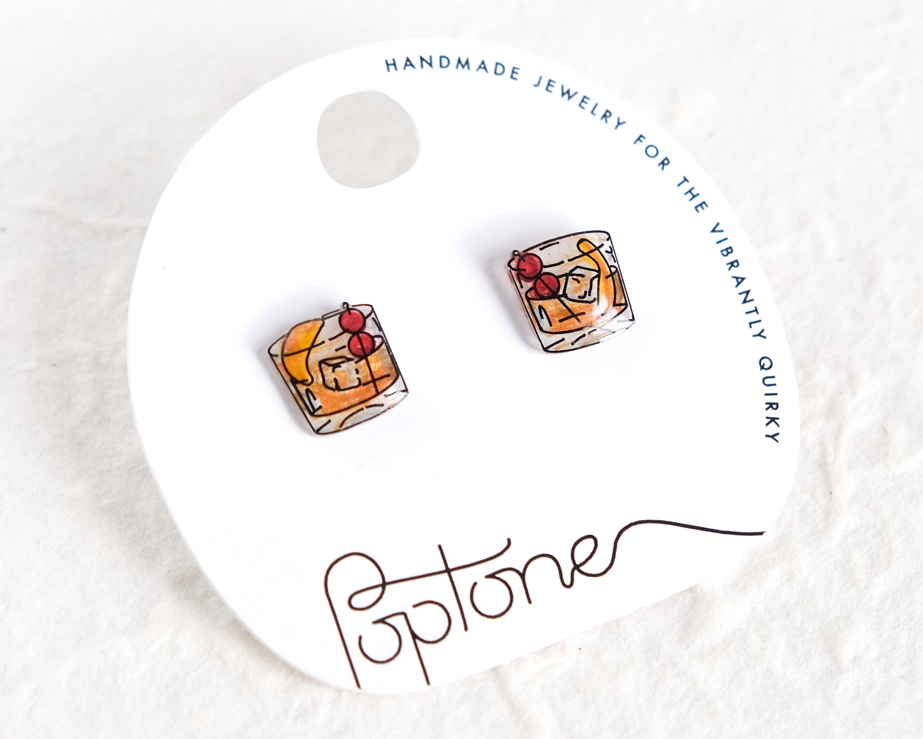Old Fashioned Cocktails | glass of whiskey drink cocktail party earrings