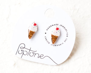 a pair of ice cream cone earrings on a card