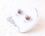 Load image into Gallery viewer, a pair of earrings with a design of wine glasses on a white background.
