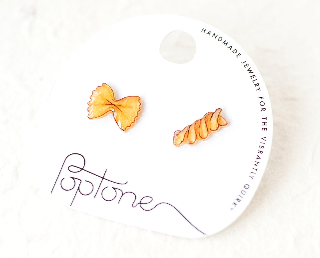 a pair of pasta stud earrings, bowtie and rotini