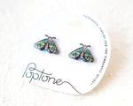 Load image into Gallery viewer, A pair of earrings with butterfly designs, as shown on the packaging.
