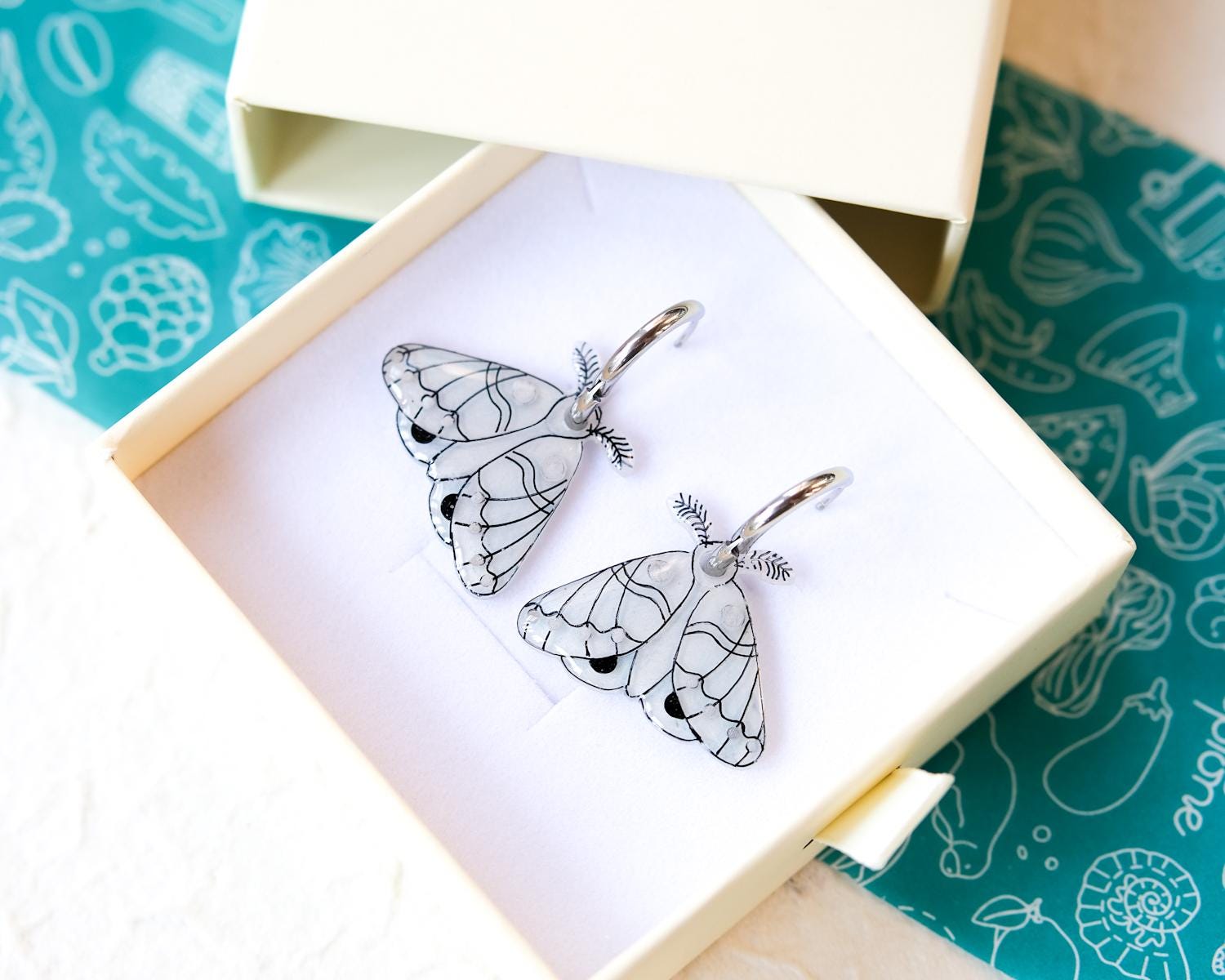 White and Silver Elegant Moth Earrings on Silver Hinged 12 mm Huggie Hoops