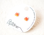 Load image into Gallery viewer, a pair of earrings, each with a candy corn-shaped design, displayed on a white background.
