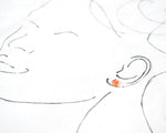 Load image into Gallery viewer, The image is a simple line drawing of a face, with a small orange gemstone placed on the ear.
