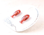 Load image into Gallery viewer, a pair of red lobster earrings displayed on a white background.
